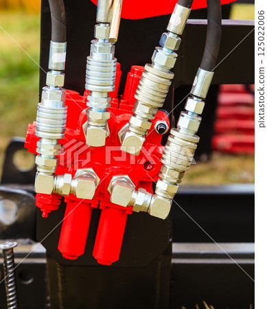 Pneumatic, hydraulic machinery made of steel closeup Pneumatic, hydraulic machinery made of steel closeup 125022006
