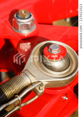 Detailed closeup of screw on indrustrial machinery Detailed closeup of screw on indrustrial machinery 125022023