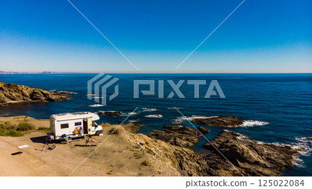 Camper car on coast, Almeria Spain 125022084