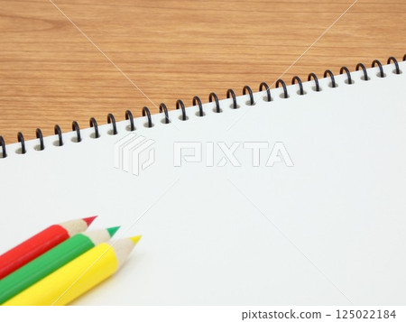 Sketchbooks and colored pencils 125022184