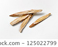 Astragalus on white background, medium astragalus wood 125022799