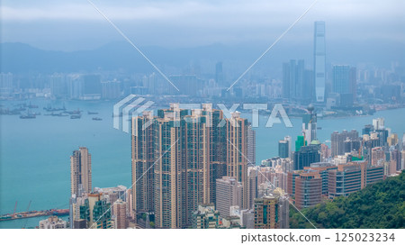 April 4 2025 Urban Hong Kong Buildings and Surrounding Green Hills, hk April 4 2025 Urban Hong Kong Buildings and Surrounding Green Hills, hk 125023234