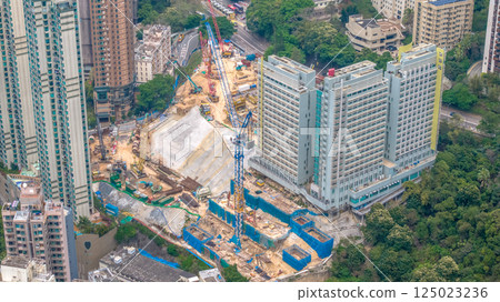April 4 2025 View of an Urban High-Rise Construction Site and Nearby Buildings, hk 125023236
