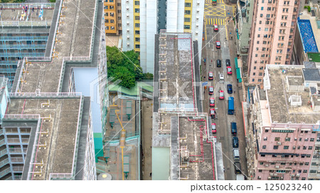 April 4 2025 View of Narrow City Streets Surrounded by Tall Urban Buildings, hk April 4 2025 View of Narrow City Streets Surrounded by Tall Urban Buildings, hk 125023240