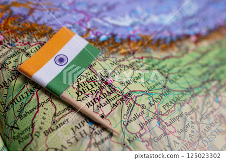 Flag of India close-up on the map. The capital of New Delhi. Close-up of the world map. India 125023302