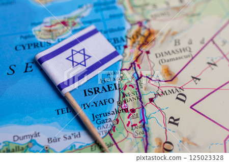 Flag of Israel close-up on the map. The capital Jerusalem. Close-up of the world map. Israel 125023328