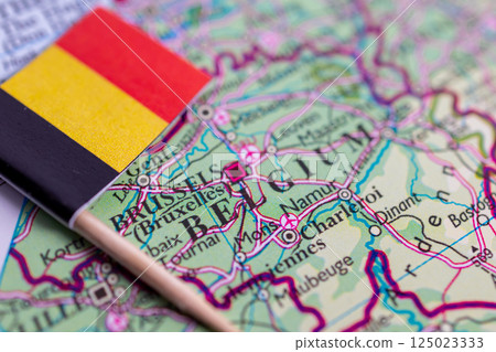 Flag of Belgium close-up on the map. Capital Brussels. Close-up of the world map. Belgium Flag of Belgium close-up on the map. Capital Brussels. Close-up of the world map. Belgium 125023333