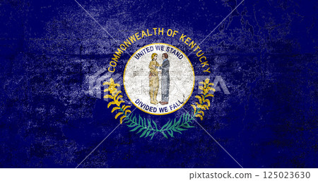 Kentucky State Flag. Dirty Kentucky state flag on the wall. Kentucky State Flag. Dirty Kentucky state flag on the wall. 125023630