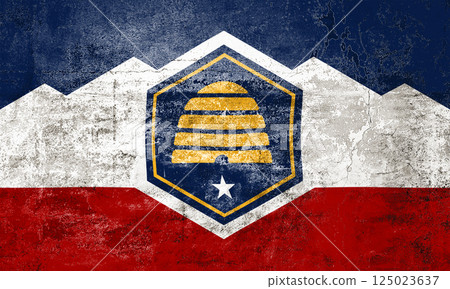Utah State Flag. Dirty Utah state flag on the wall. Utah State Flag. Dirty Utah state flag on the wall. 125023637
