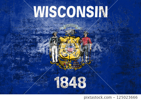 Wisconsin State Flag. Dirty Wisconsin state flag on the wall. 125023666
