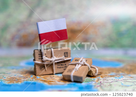 Flag of Poland near the parcels on the world map. World trade. Exports and imports of goods. Economy of the country Flag of Poland near the parcels on the world map. World trade. Exports and imports of goods. Economy of the country 125023740