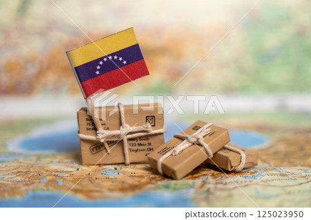 International Shipping and Delivery Services to Venezuela: Small Packages on World Map with Venezuelan Flag and Address Labels 125023950