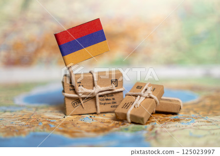 International Shipping and Delivery Services from Armenia: Small Packages with National Flag on World Map Background 125023997