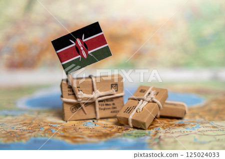 International Shipping to Kenya: Small Parcels with Kenyan Flag on World Map, Global Postal and Delivery Services Concept International Shipping to Kenya: Small Parcels with Kenyan Flag on World Map, Global Postal and Delivery Services Concept 125024033