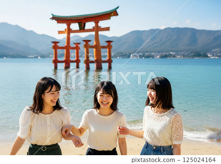 Three women sightseeing in Miyajima 125024164