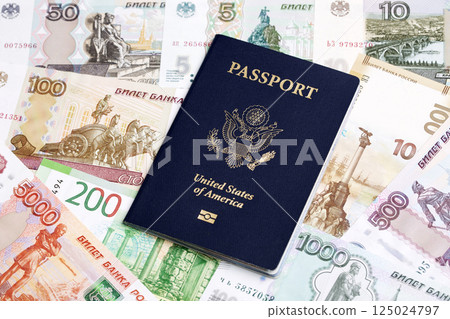American passport on a Russian money American passport on a Russian money 125024797