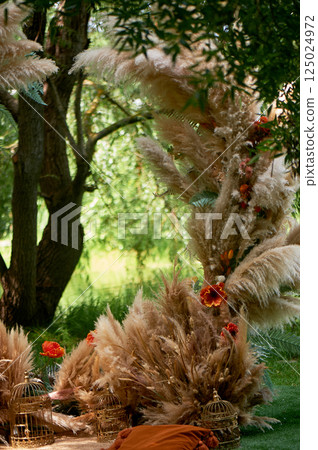 A chic wedding arch for off-site registration from the pampas. Paradise glade 125024972