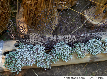 Wedding decoration. Floristics. Bow Alium. Composition in a log. Garden d cor. Wedding decoration. Floristics. Bow Alium. Composition in a log. Garden d cor. 125024982