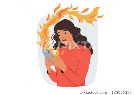 Burning phone in woman hands symbolizes wasting time on useless applications and social networks 125025393