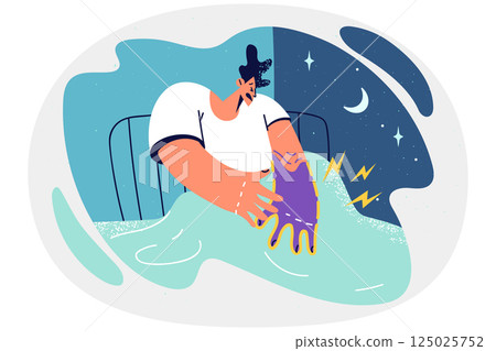 Stressed man wakeup at night with hand numbness 125025752