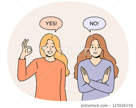 Women with opposing opinions demonstrate yes and no gestures, answering question or suggestion 125026150