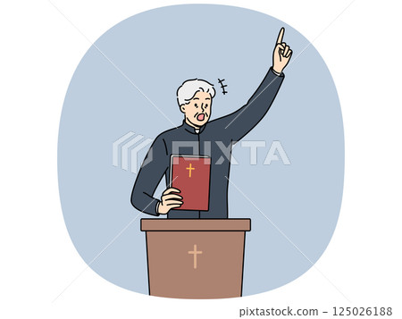 Priest with bible shouts and standing behind podium with christian catholic crucifix. 125026188