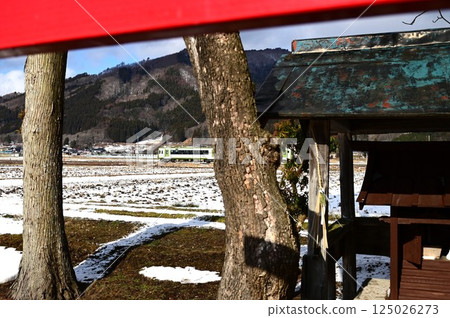 Kamaishi Line Kiha 100 series train seen from the shrine Kamaishi Line Kiha 100 series train seen from the shrine 125026273
