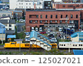 THE ROYAL EXPRESS arriving at Minami-Wakkanai Station and its passenger bus leaving the station 125027021