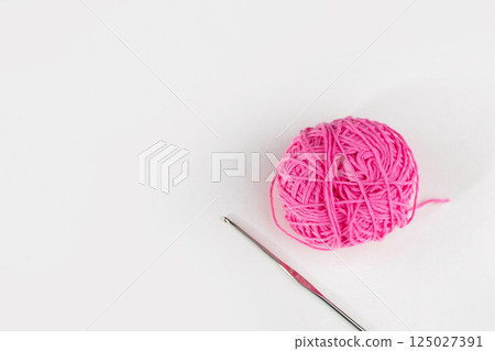 Balls of pink yarn Balls of pink yarn 125027391