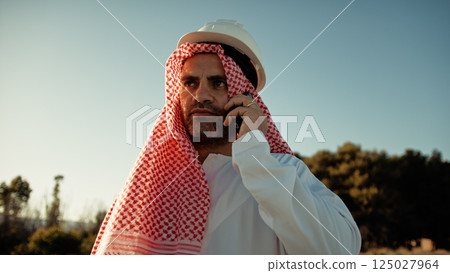 Business Call For A Sheik At The Worksite  125027964