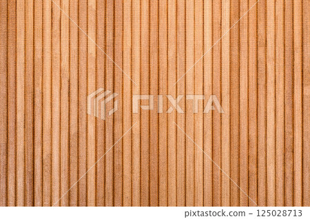 Parallel wooden slats forming warm brown textured background Parallel wooden slats forming warm brown textured background 125028713