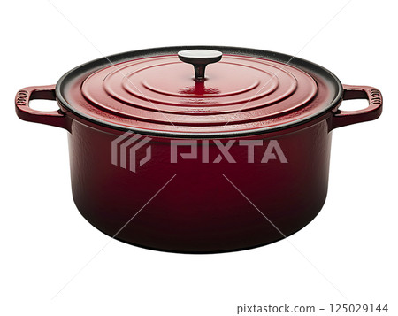 A rich red enameled cast iron pot, complete with lid, sits on a minimalist white background.  Its classic design evokes warmth, comfort, and culinary creativity. 125029144