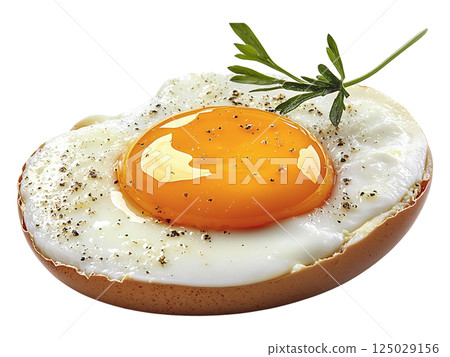 A perfectly cooked fried egg in its shell, seasoned with pepper and garnished with fresh herbs. A perfectly cooked fried egg in its shell, seasoned with pepper and garnished with fresh herbs. 125029156