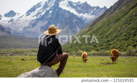 hikers in the mountains enjoying the majestic view 125029585