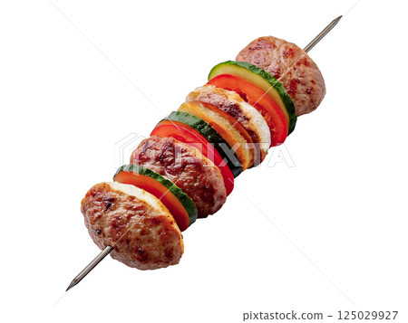 Grilled meat skewers with zucchini and tomato slices.  Perfect for restaurant menus, cookbooks, or food blogs.  High-resolution image showcasing delicious, appetizing food photography. 125029927