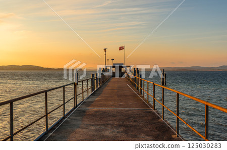 Pier on Lake Constance in the evening light, Canton of Thurgau, Switzerland 125030283