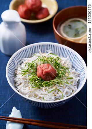 Boiled whitebait rice bowl topped with pickled plum Boiled whitebait rice bowl topped with pickled plum 125030556