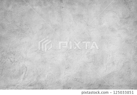 Textured gray concrete wall surface with visible plaster patterns and subtle tonal variations, ideal as a background or texture Textured gray concrete wall surface with visible plaster patterns and subtle tonal variations, ideal as a background or texture 125033851
