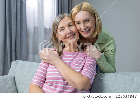 Happy women spending time together and feeling enjoyed and pleased 125034848