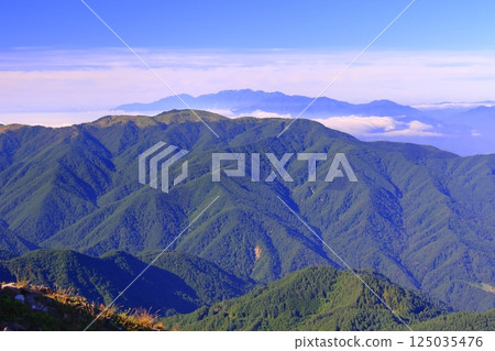 Mt. Hachibuse seen from Ogahana with the Central Alps in the background 125035476