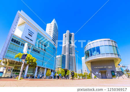 Tokyo cityscape in Japan: New greenery in April...Landmark Tower in front of Sakuragicho Station and Air Cabin Sakuragicho Station, etc. = April 14th 125036917