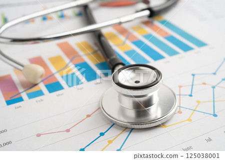 Stethoscope on spreadsheet and graph paper, Finance, Account, Statistics, Investment, Analytic research data economy and Business company. Stethoscope on spreadsheet and graph paper, Finance, Account, Statistics, Investment, Analytic research data economy and Business company. 125038001