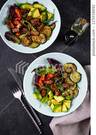 Healthy vegan keto salad with tofu and avocado Healthy vegan keto salad with tofu and avocado 125038092