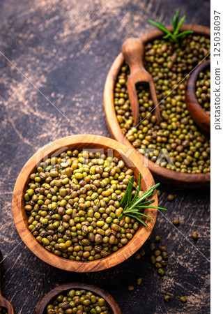 Raw uncooked mung beans on black background 125038097