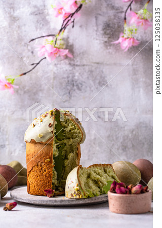 Traditional Easter cake kulich with pistachio Traditional Easter cake kulich with pistachio 125038135