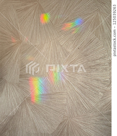 Blurred rainbow light refraction texture overlay effect for photo and mockups. Organic drop diagonal holographic flare on a white wall. Shadows for natural light effects Blurred rainbow light refraction texture overlay effect for photo and mockups. Organic drop diagonal holographic flare on a white wall. Shadows for natural light effects 125039263