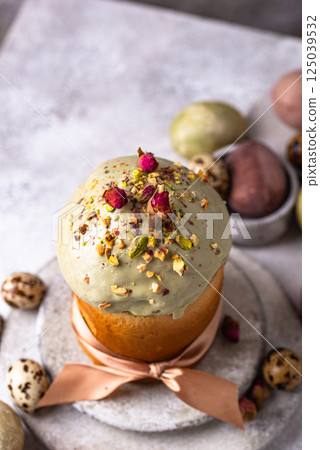 Traditional Easter cake kulich with pistachio Traditional Easter cake kulich with pistachio 125039532