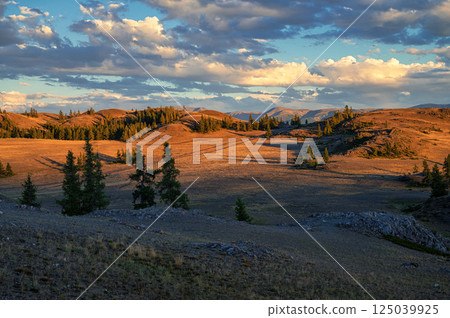 Sunset Over Serene Mountain Landscape 125039925