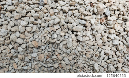 Close Up of Light Gray Gravel Texture with Various Rock Sizes for Construction and Landscaping Projects 125040333