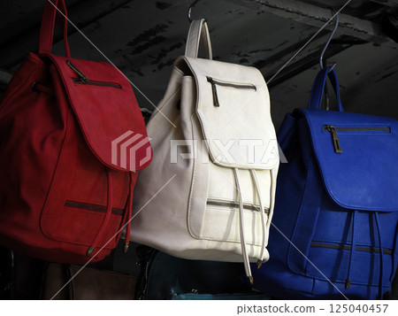 colorful leather backpacks in florence street market colorful leather backpacks in florence street market 125040457
